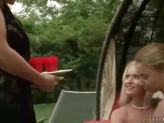 Two girlfriends punishing enticing blonde